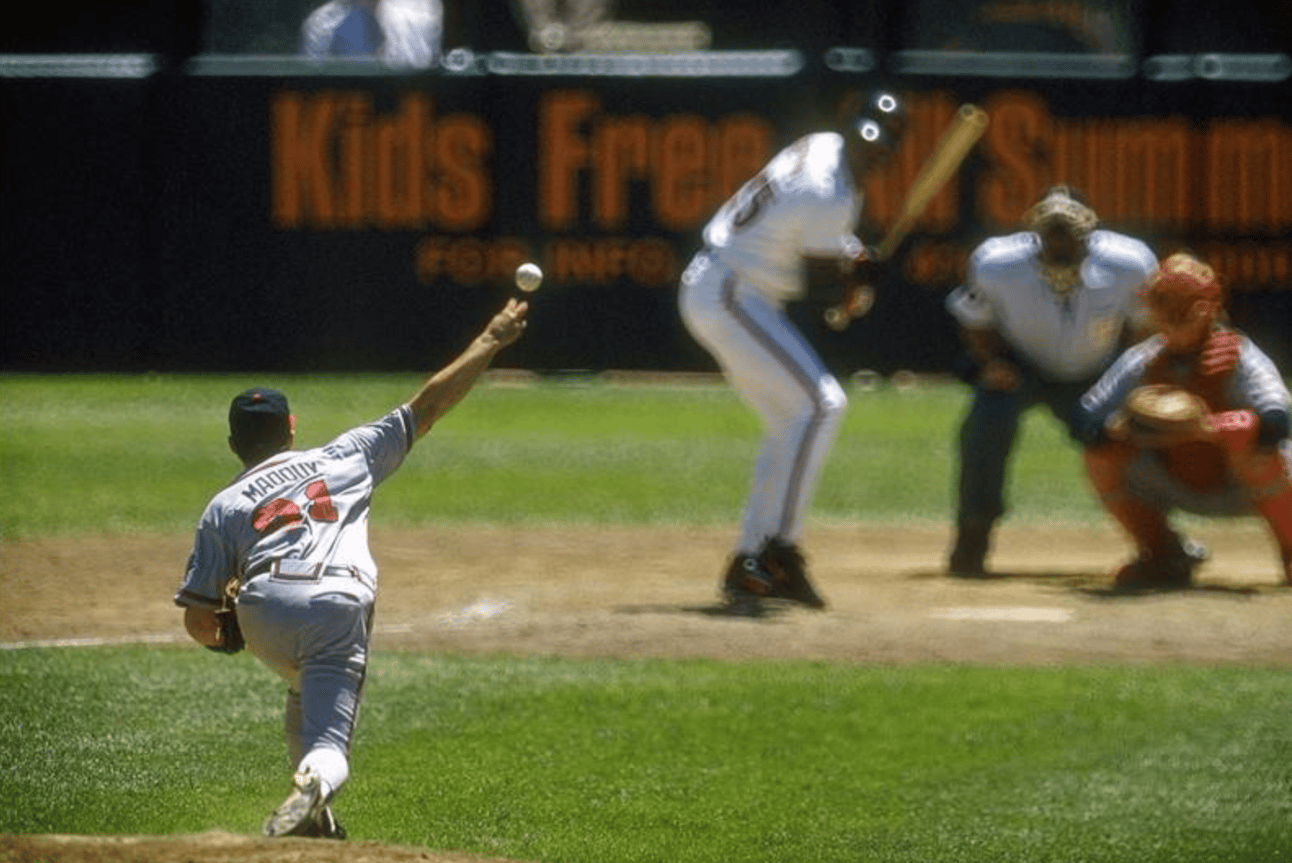 Greg Maddux pitching to Barry Bonds