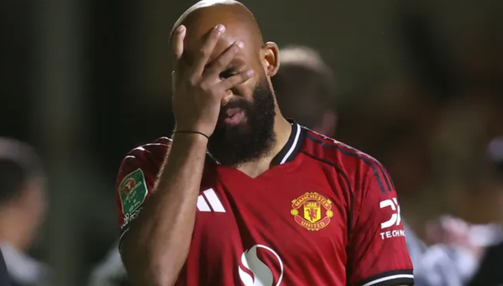 Bryan Mbeumo of Manchester United with his hand on his face after missing a penalty kick which cost his team the match