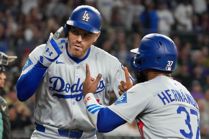 Freddie Freeman and Teoscar Hernández of the Dodgers celebrating after a Freeman home run