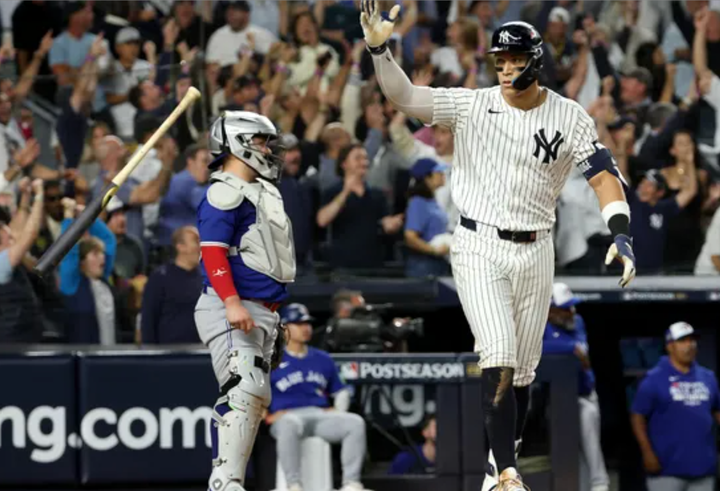 Aaron Judge flipping his bat after a game-tying home run in Game 3