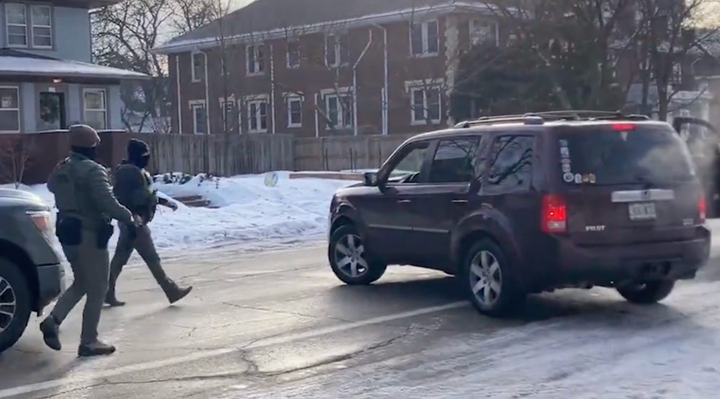 ICE officers approaching the vehicle of Renee Nicole Good just before murdering her
