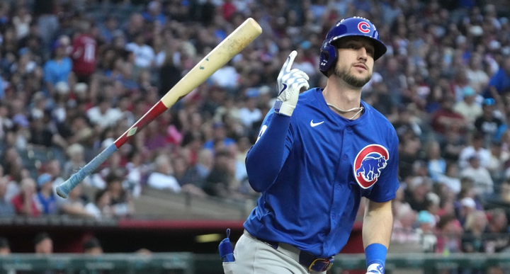 Kyle Tucker flipping a bat after a home run 
