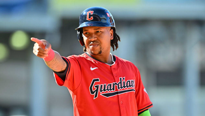 Jose Ramirez, standing on second base, pointing at the guys in his dugout with authority 