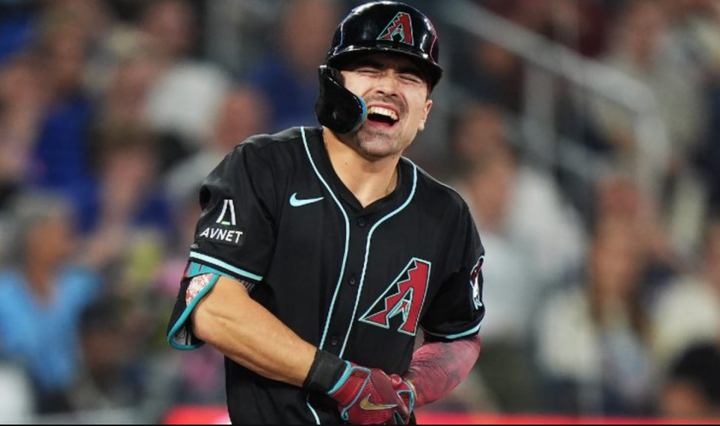 Corbin Carroll grimacing in pain