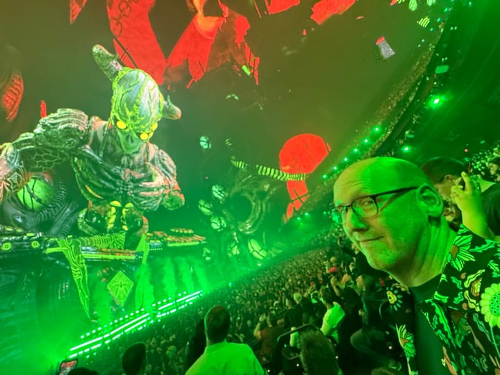 Me at the Sphere. There's a giant demon DJ on the screen above me