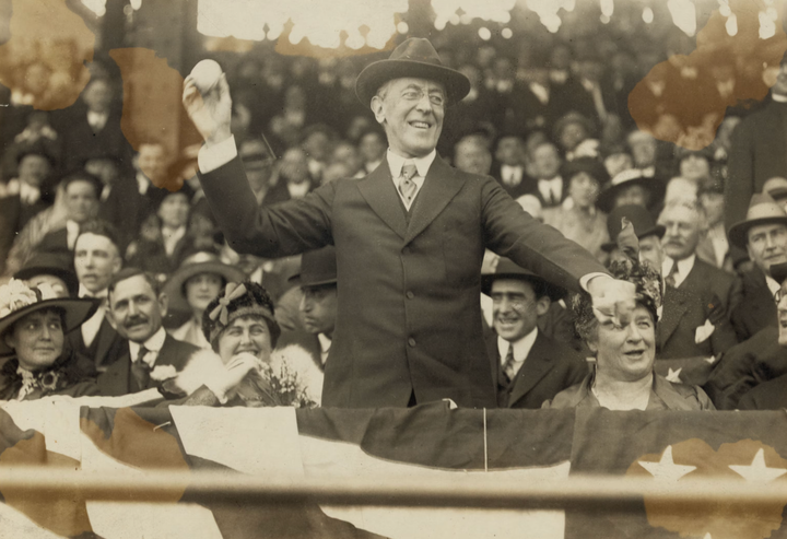 President Woodrow Wilson throwing out a first pitch