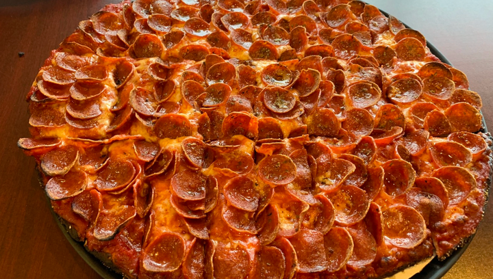 A tasty-looking picture of a pepperoni-covered Columbus-style pizza